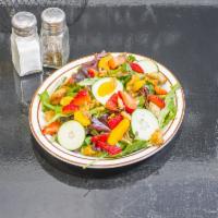 RoSo's Salad ·  Mixed greens tossed with fresh strawberries, Mandarin oranges, cucumbers, candied walnuts, ...