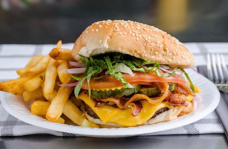 Double Beef Burger with Bacon and Cheese · 12 oz. Served with lettuce, tomato, onion and pickle.