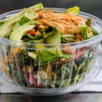 Santa Fe Salad · Cajun chicken, mixed greens and romaine lettuce, avocado, corn, cheddar cheese, tomato, onio...