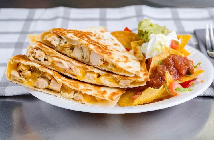 Quesadilla · Filled with pico de gallo, melted mixed cheese and served with salsa and sour cream.