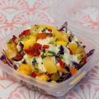 Cole Slaw · Red cabbage, pineapple, mango, red bell peppers and green onion with coleslaw dressing