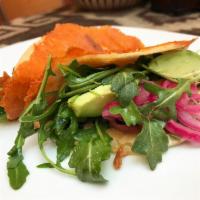 Inside Out Quesadilla · crispy cheese crusted corn tortillas stuffed with avocado slices, cured red onions and dress...