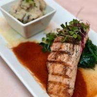 Grilled Salmon · served over sautéed spinach and mushroom mashed potatoes, finished with a salsa roja