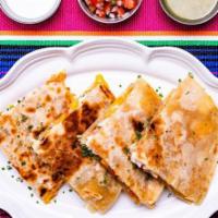 Quesadilla · Fresh made tortillas, Oaxaca and cheddar cheese, lettuce, guacamole, pico de gallo, sour cre...