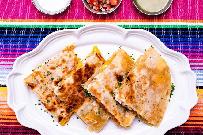 Quesadilla · Fresh made tortillas, Oaxaca and cheddar cheese, lettuce, guacamole, pico de gallo, sour cream, jalapenos. Add grilled chicken, beef fajita, brisket or shrimp.