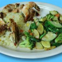 Camarones al Mojo · 6 jumbo grilled shrimp marinated with a garlic sauce. Served with white rice and sauteed veg...