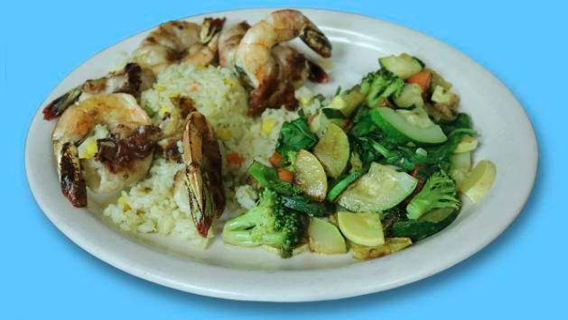Camarones al Mojo · 6 jumbo grilled shrimp marinated with a garlic sauce. Served with white rice and sauteed vegetables.