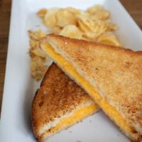 Kid's Grilled Cheese · Texas-sized toast and melted American cheese.