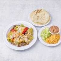 Fajita Mixta · Steak, shrimp and chicken.