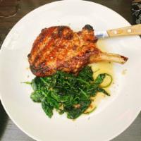 French Cut Pork Chop · Option to have it fried or grilled with jerk sauce.
