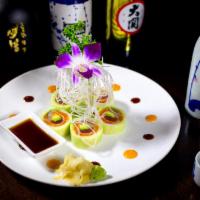 Naruto Roll · Tuna, salmon, yellowtail and avocado and caviar rolled with cucumber wrap .DOSEN'T COME WITH...