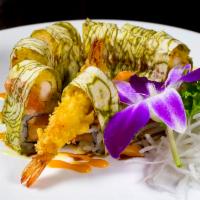 O.M.G. Roll · Lobster salad and salmon, Top with shrimp Tempura and Spicy Tuna Wrap with Kombu Paper, Garn...