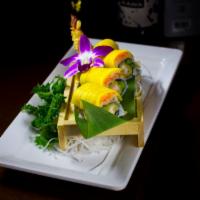 Masa Roll · Shrimp tempura, asparagus inside, outside, spicy crab topped with mango.