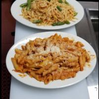 Pasta with shrimp  ·  Penne pasta,linguine pasta  Alfredo, vodka,  marinara sauce, Parmesan cheese 