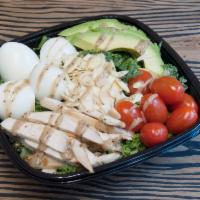 California Dream Salad · Rosemary grilled chicken, avocado, egg white, cherry tomato, toasted almond and kale with ba...
