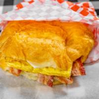 Bacon, Egg, and Cheese Croissant · Flaky croissant with bacon, egg and cheese.