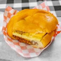 Sausage Egg Cheese Biscuit · Soft bread biscuit with a sausage patty and cheese.