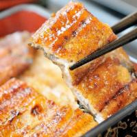 Una Don · Broiled eel over sushi rice.
