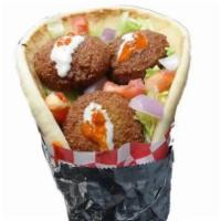 3. Veggie Falafel Gyro فـلافـل جـايـرو · Falafel and pita bread with lettuce, tomatoes, pickles and tahini sauce.