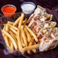 14. Chicken Arabi with Fries دجاج عربي · Chicken shawarma arabi  warped in saj bread. Cut to small bite size pieces and served on a b...