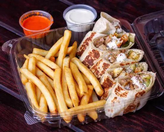 14. Chicken Arabi with Fries دجاج عربي · Chicken shawarma arabi  warped in saj bread. Cut to small bite size pieces and served on a bed of fries. Side of pickles and garlic and hot sauce.
