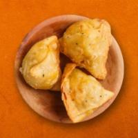 Samosa Plate  · Two pieces of triangular pastry with a savory filling of spiced potatoes, peas, and lentils....