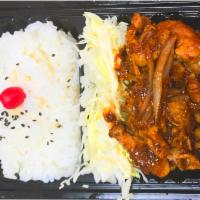 Pork Ginger Bento · Thinly sliced pork and onion cooked with soy sauce and sliced ginger.
