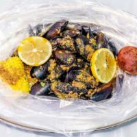 Black Mussel · Half pound seafood comes with one potato, whole pound comes with one potato and one corn