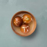 Gulab Jamun  · Deep fried cottage cheese balls steeped in a spice sugar syrup. 
