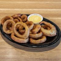 Alex's Gourmet Onion Rings · Fried battered onion.