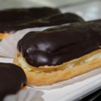 Éclair · French oblong pastry made with choux dough filled with a cream and topped with chocolate ici...