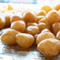Lokhma · Middle Eastern donut balls dipped in honey syrup.
1 pound