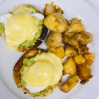 Samantha’s Eggs Benedict · Smashed avocado, poached egg, hollandaise sauce and toasted English muffin.