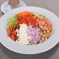 Chopped Salad · Roasted red peppers, tomatoes, celery, cucumbers, red onions, chickpeas, carrots, feta, pepp...