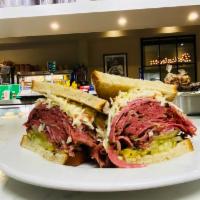 Picklelicious Pastrami Sandwich · Hot pastrami, sliced dill pickle and coleslaw.