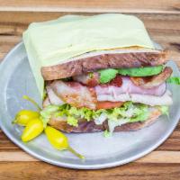 Club Sandwich · Ham, turkey, bacon, avocado, lettuce, and tomato.