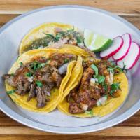 Street Tacos · Choice of meat, onions, cilantro, and salsa.