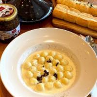 Asiago Gnocchi · Asiago cheese gnocchi with truffle creamy sauce.