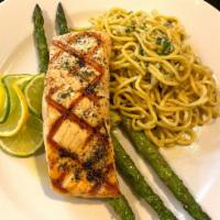 Grilled Salmon · 10 oz. pacific salmon marinated with mixed herbs. Served with pasta and asparagus.