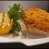 Seafood Stuffie · 1 Jumbo house stuffed Quahog loaded with shrimp,
clams, scallops and Cod then baked to perf...