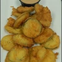 Fried Pickles · House brined pickles, lightly hand breaded then fried until 
golden brown. Served with our ...