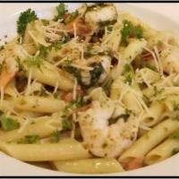 Shrimp  Pesto Pasta · Jumbo shrimp with diced tomatoes and baby arugula sautéed  in extra virgin olive oil finishe...