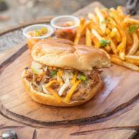 Slow and Low Cooked Bohemian Pulled Pork Sandwich · We butcher, brine, and smoke (slow and low) our pork. It is seasoned to perfection.You'll ta...