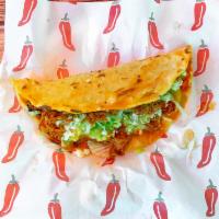 Quesadilla · Tortilla hand made with mozzarella cheese, fresh mexican cheese, lettuce salsa and meat of y...