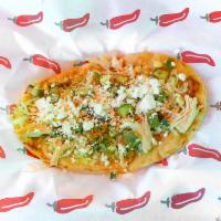 Huarache · Tortilla hand made with fresh mexican cheese, lettuce and meat of your choice.