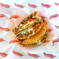 Crispy tacos · 3 hard shell tacos with lettuce, sour cream, mexican fresh cheese, salsa and meat of your ch...
