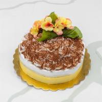 Tiramisu Cake · Sweet Italian cream cheese and marsala custard between layers of espresso and rum laced lady...