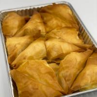 Shabiet with Ashta  · These pastries are made with layers and layers of phyllo dough, then filled with traditional...