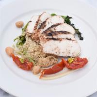 Moroccan Chicken Breast · Mary's Chicken sous vide, minted quinoa and heirloom tomato confit.
