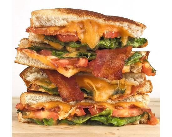 Grilles cheese BLT · Bacon, lettuce and tomato with light mayo and grilled cheese on Bread. 